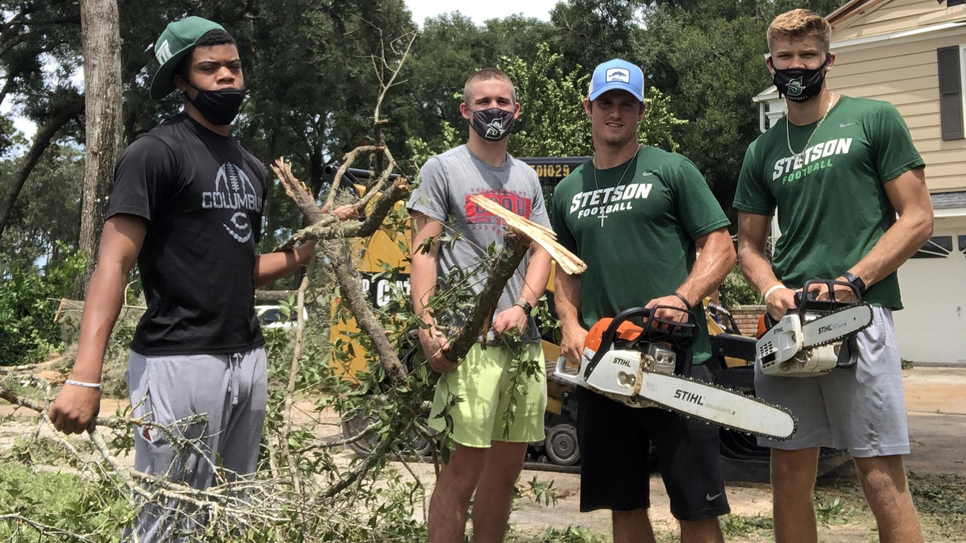 Ready Team, disaster response members cleaning trees debris